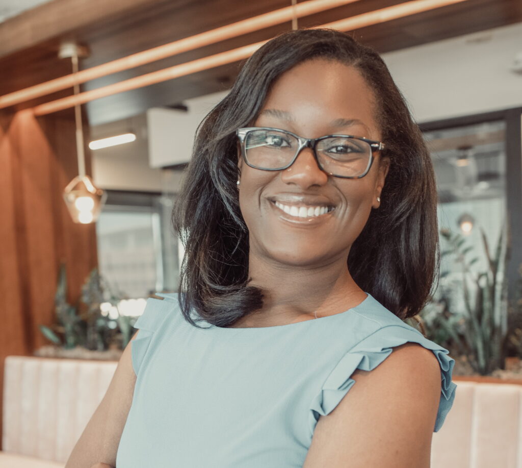 Professional portrait of career counselor Ezoria Aisian at Komar and Associates