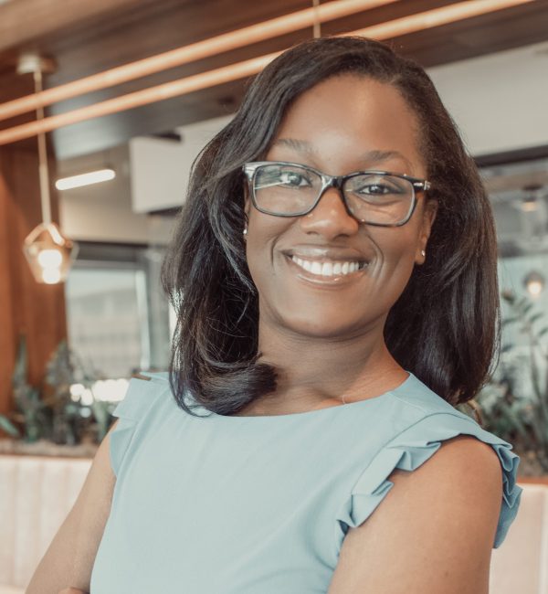 Professional portrait of career counselor Ezoria Aisian at Komar and Associates
