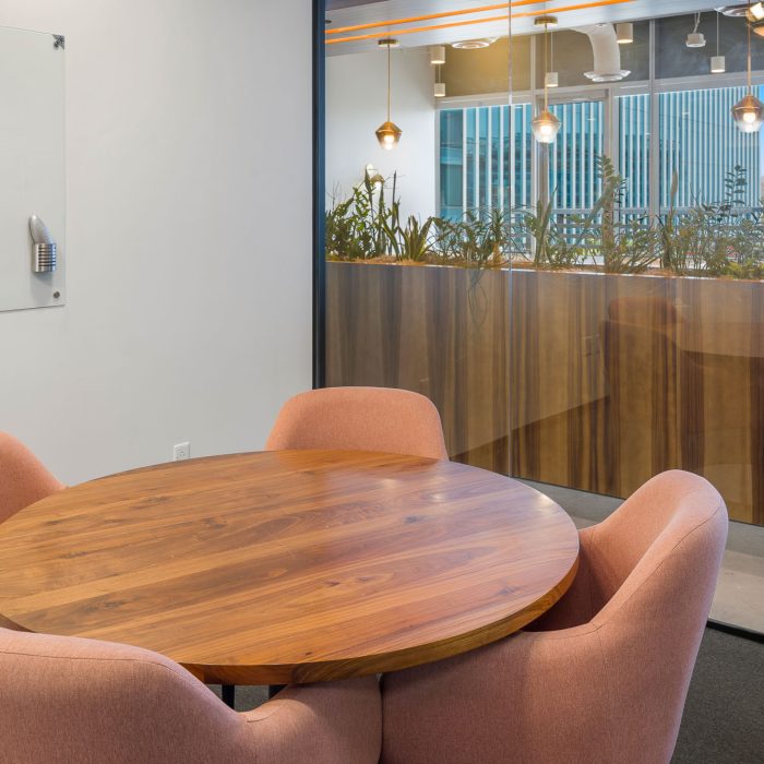Wood table meeting space in private career counseling office in Tempe